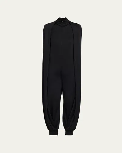 Alaïa Jersey Wool-blend Bat Jumpsuit In Black