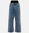 Alaïa Low-rise Snow Denim Jeans With Knit Waistband In Blue