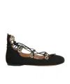 Alaïa Perforated Patent Leather Mules In Black