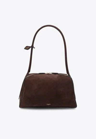 Alaïa Le Bouledogue Bowling Shoulder Bag In Nubuck Leather In Brown