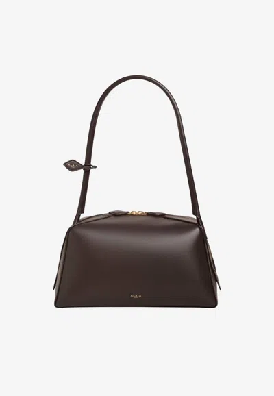 Alaïa Le Bouledogue Calf Leather Shoulder Bag In Brown