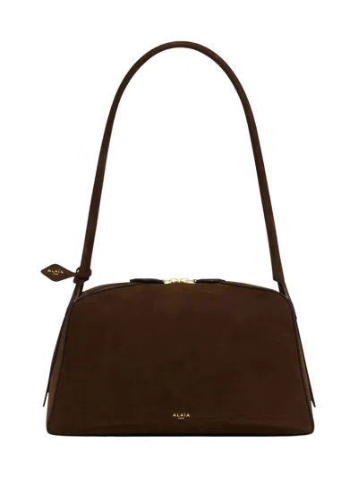 Alaïa Le Bouledogue Bowling Shoulder Bag In Nubuck Leather In Brown