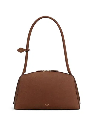 Alaïa Le Bouledogue Nabuk Leather Shoulder Bag In Brown
