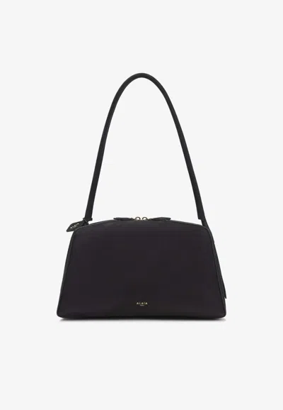 Alaïa Le Bouledogue Bowling Shoulder Bag In Nubuck Leather In Black
