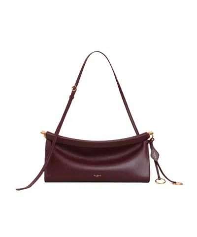 Alaïa Le Click East West Medium Bag In Leather In Red