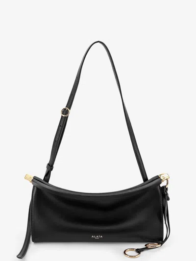 Alaïa Le Click East West Small Leather Crossbody Bag In Black
