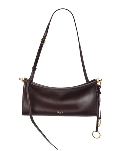 Alaïa Le Click East West Small Leather Shoulder Bag In Brown