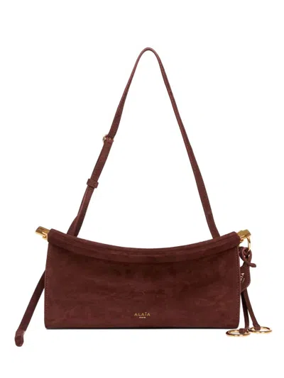 Alaïa Le Click East West Small Leather Shoulder Bag In Burgundy