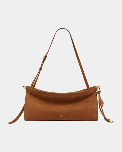 ALAÏA LE CLICK MEDIUM SHOULDER BAG IN LEATHER