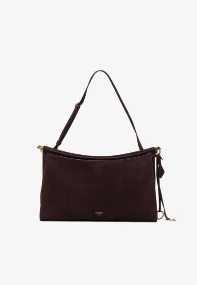 Alaïa Le Click Pocket 35 Nubuck Shoulder Bag In Pattern