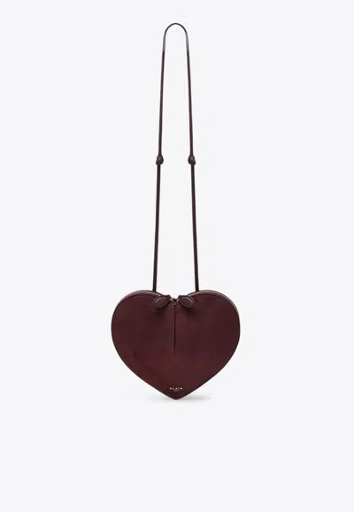 Alaïa Le Coeur Suede Crossbody Bag In Burgundy