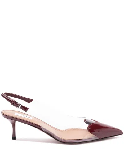 ALAÏA LE CŒUR SLINGBACKS IN PATENT LEATHER