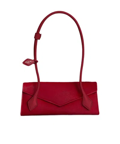 Alaïa Le Teckel Flap Small Bag In Haircalf In Red
