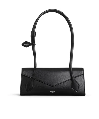 Alaïa Le Teckel Flap Small Bag In Shiny Goatskin In Black