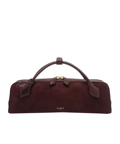 Alaïa Le Teckel Handbag In Black