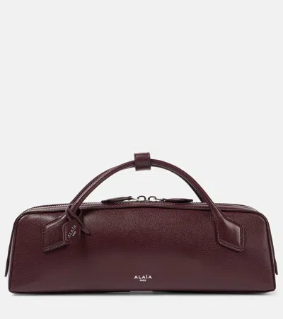 Alaïa Le Teckel Leather Clutch In Red