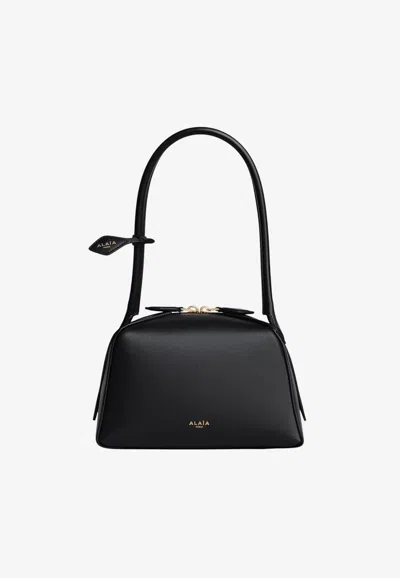 Alaïa Le Teckel Leather Shoulder Bag In Black