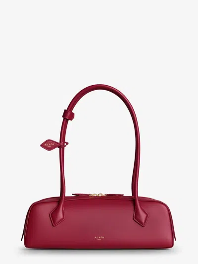 Alaïa Le Teckel Leather Shoulder Bag In Burgundy