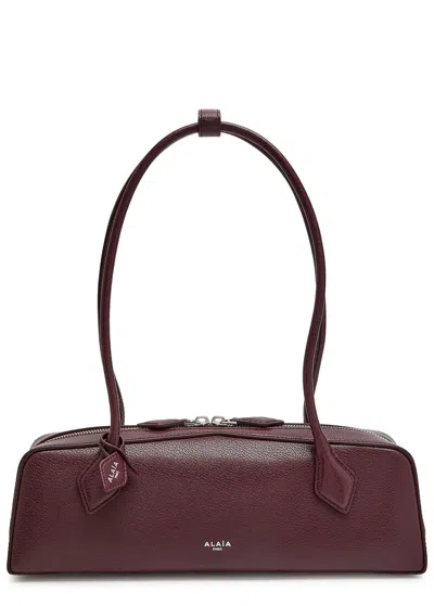 Alaïa Le Teckel Medium Grained Leather Shoulder Bag In Burgundy
