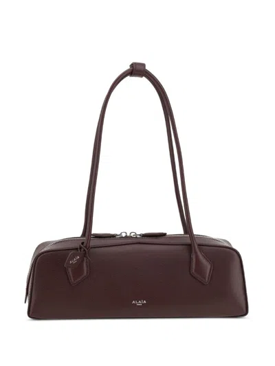 Alaïa Le Teckel Medium Leather Shoulder Bag In Red