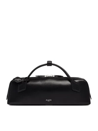 Alaïa Le Teckel Pouch In Polished Goatskin In Black