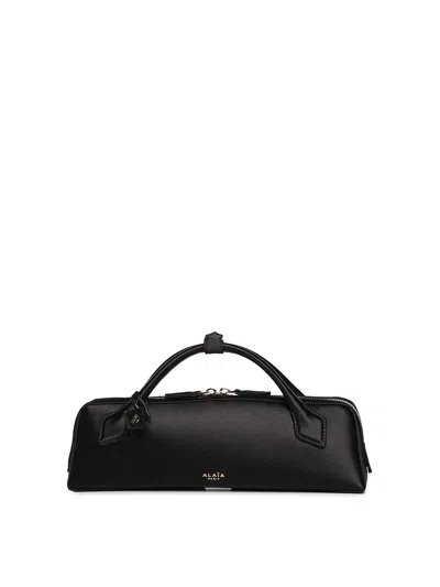 Alaïa Le Teckle Satin Clutch Bag In Black
