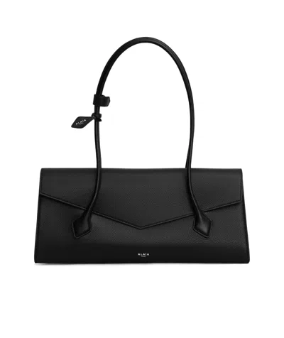 Alaïa Le Teckel Shoulder Bag In Black