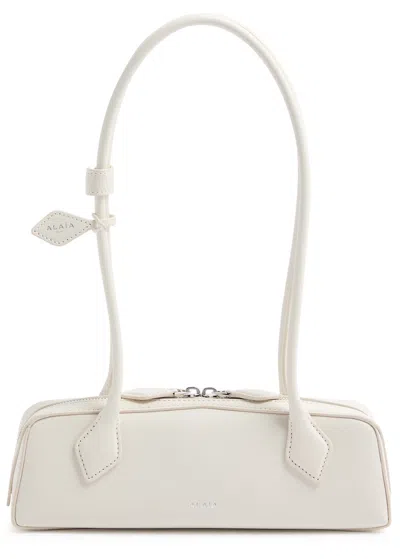 Alaïa Le Teckel Medium Grained Leather Shoulder Bag In Ivory