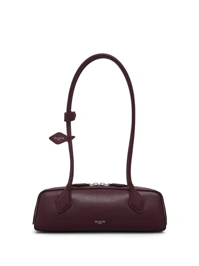 Alaïa Small Leather Le Teckel Shoulder Bag In Brown