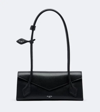 Alaïa Le Teckel Small Leather Shoulder Bag In Black