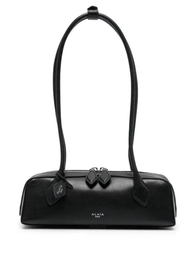Alaïa Le Teckel Small Grained Leather Shoulder Bag In Black