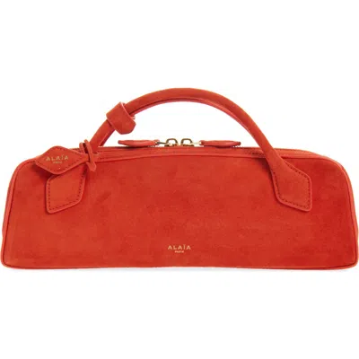 Alaïa Le Teckel Leather Clutch In Orange