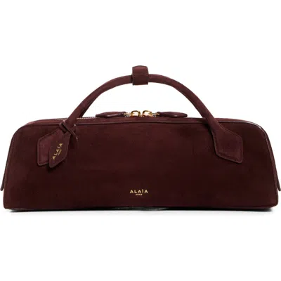 ALAÏA ALAÏA LE TECKEL SUEDE EAST/WEST CLUTCH
