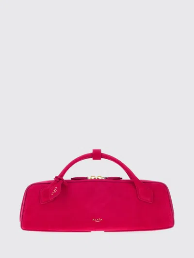 Alaïa Le Teckel Suede Sheepskin Handbag With Logo Charm In Pink