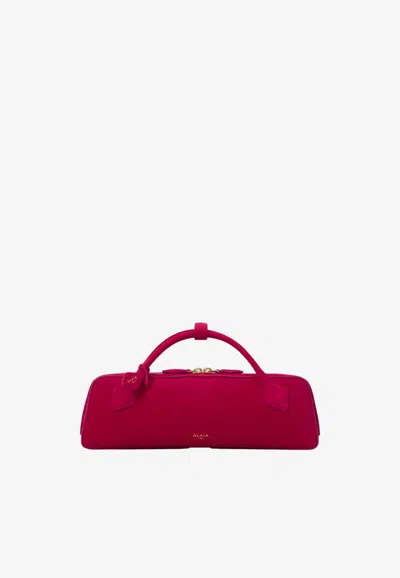 Alaïa Le Teckel Top Handle Bag In Suede In Fuchsia