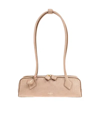 Alaïa Le Teckel Zip-up Small Shoulder Bag In Nude