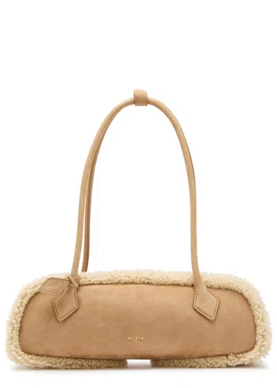 Alaïa Le Teckle Medium Shearling-trimmed Suede Shoulder Bag In Brown