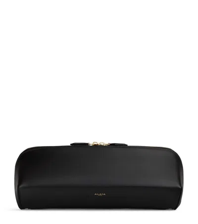 Alaïa Leather Delta Clutch Bag In Black