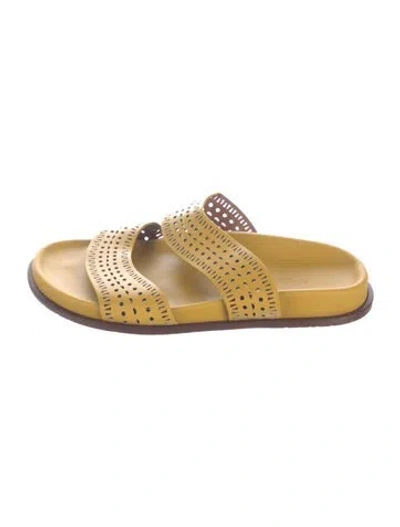 Pre-owned Alaïa Leather Lasercut Accents Slides In Yellow