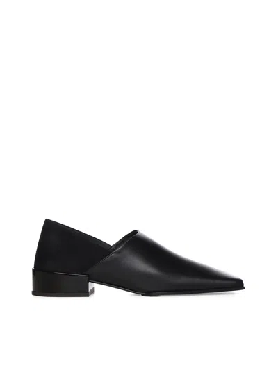 Alaïa Leather Slip-on In Black