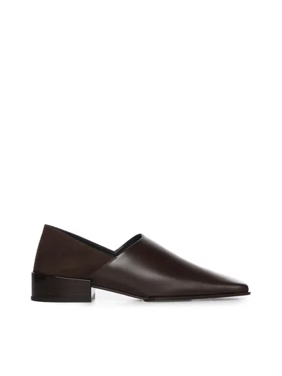 Alaïa Leather Slip-on In Brown