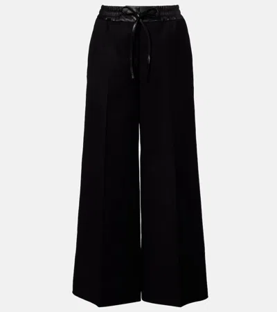 Alaïa Leather-trimmed Virgin Wool Wide-leg Pants In Black