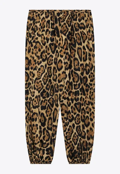 Alaïa Leopard Print Silk Pants In Brown