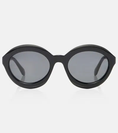 Alaïa Lettering Logo Round Sunglasses In Black