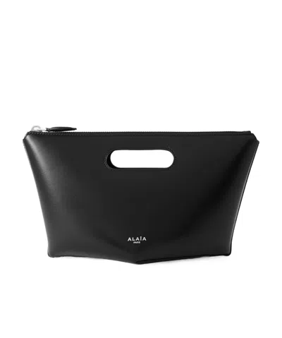Alaïa Black Folded Zipped Clutch In 999 - Noir