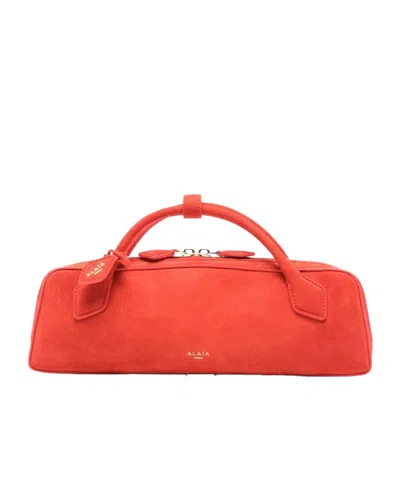 Alaïa Logo Handbag In Orange