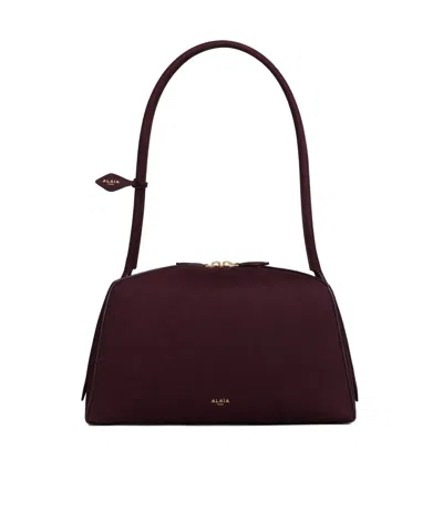 Alaïa Le Bouledogue Bowling Shoulder Bag In Nubuck Leather In Brown