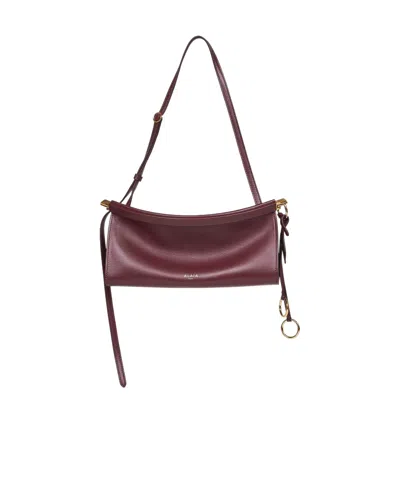 ALAÏA ALAÏA LOGO STAMP SMALL EAST WEST SHOULDER BAG
