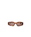 Alaïa Logo Sunglasses In Brown