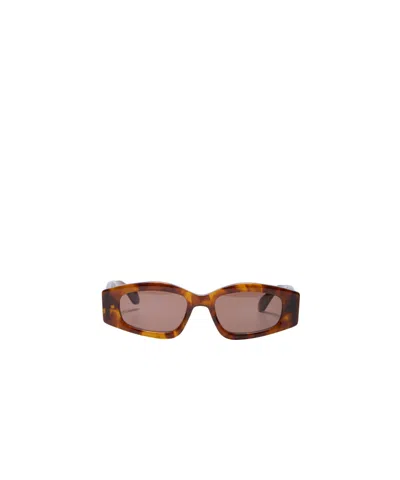 Alaïa Logo Sunglasses In Brown